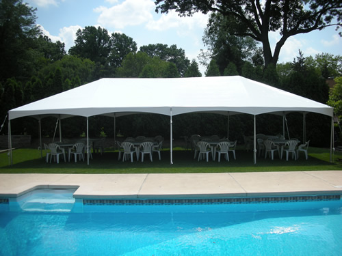 photo of a white tent set up for a backyard party in New Jersey